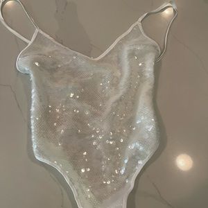 Sequin satin and mesh lace up bodysuit.